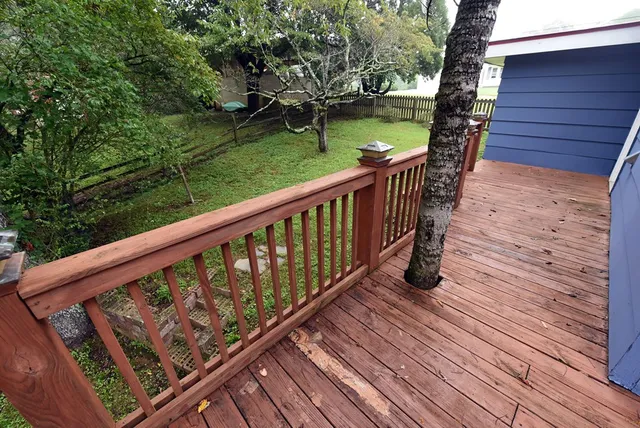 a bedroom with a bed and a mirror