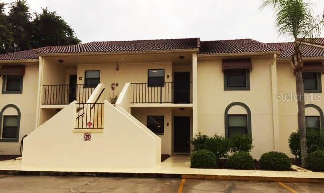 26461 Explorer Road, Unit H Punta Gorda, FL 33983 - Photo 1 of 1 a front view of a house