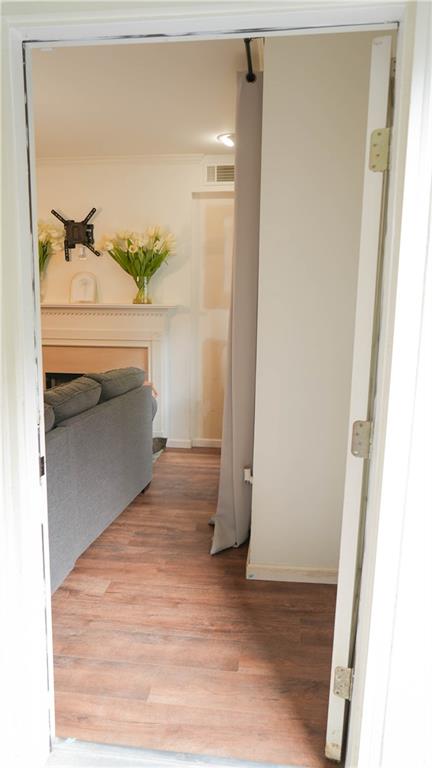 3275 Lenox Road Northeast, Unit 107 Atlanta, GA 30324 - Photo 12 of 18 a view of walk in closet and bedroom