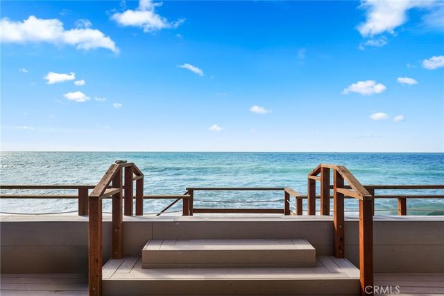 a view of a living room with furniture