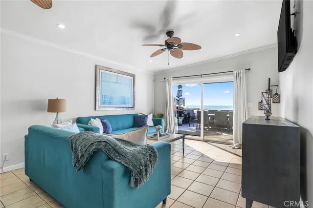 a bedroom with furniture and a flat screen tv
