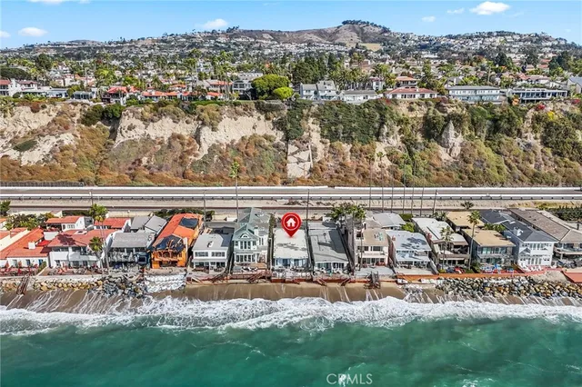 an outdoor view of swimming pool and mountain view