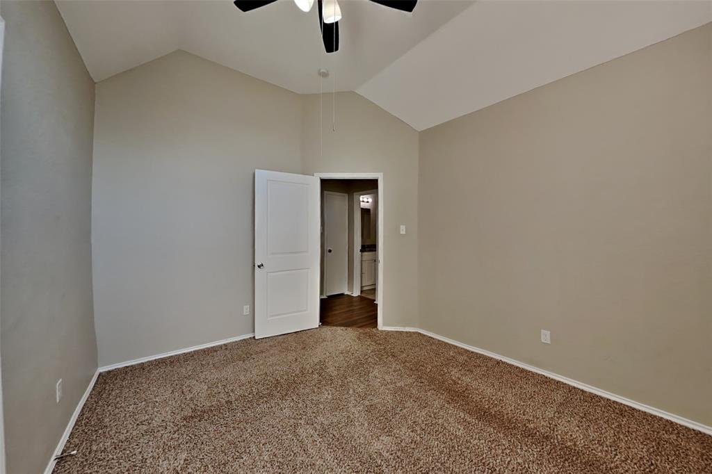 7709 Harbor Drive Rowlett, TX 75088 - Photo 11 of 19 wooden floor in an empty room