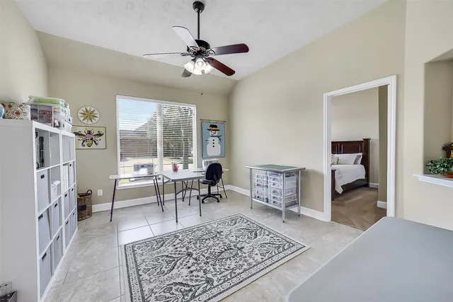 a living room with furniture and a table