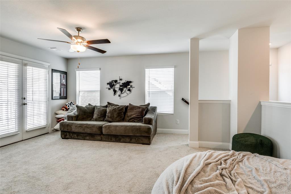 8413 Alba Lane Rowlett, TX 75089 - Photo 20 of 25 Bedroom featuring light colored carpet, access to outside, and ceiling fan