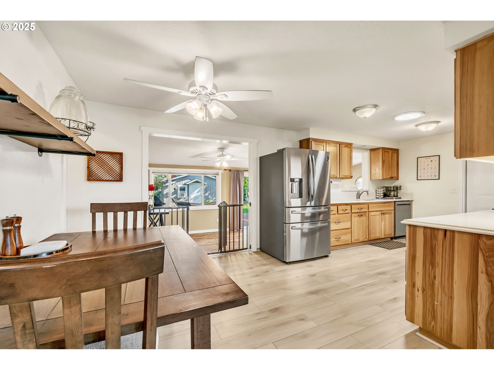 515 70th Street Springfield, OR 97478 - Photo 12 of 47 a open kitchen with refrigerator stove microwave and cabinets