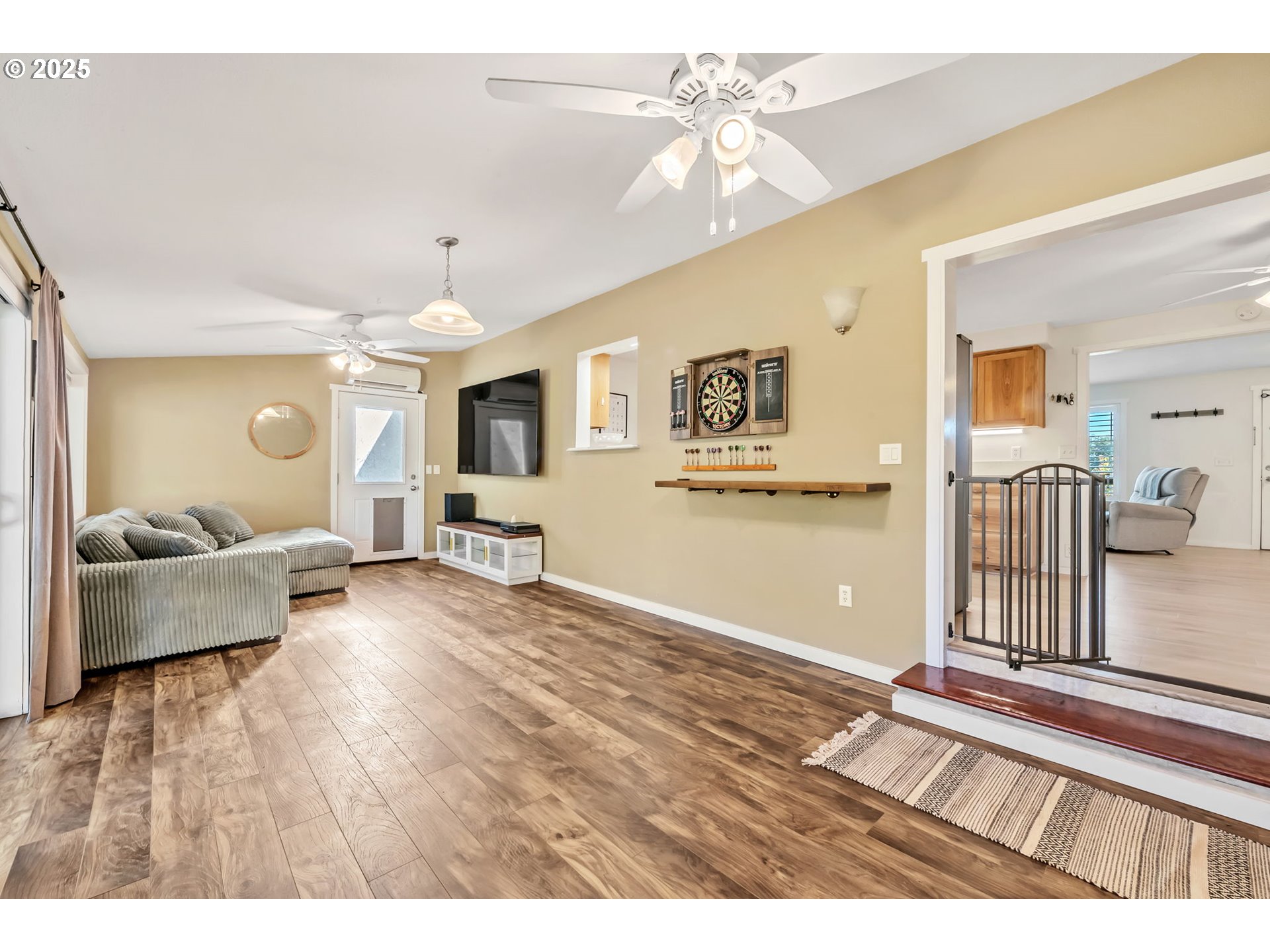 515 70th Street Springfield, OR 97478 - Photo 17 of 47 a living room with furniture and a chandelier