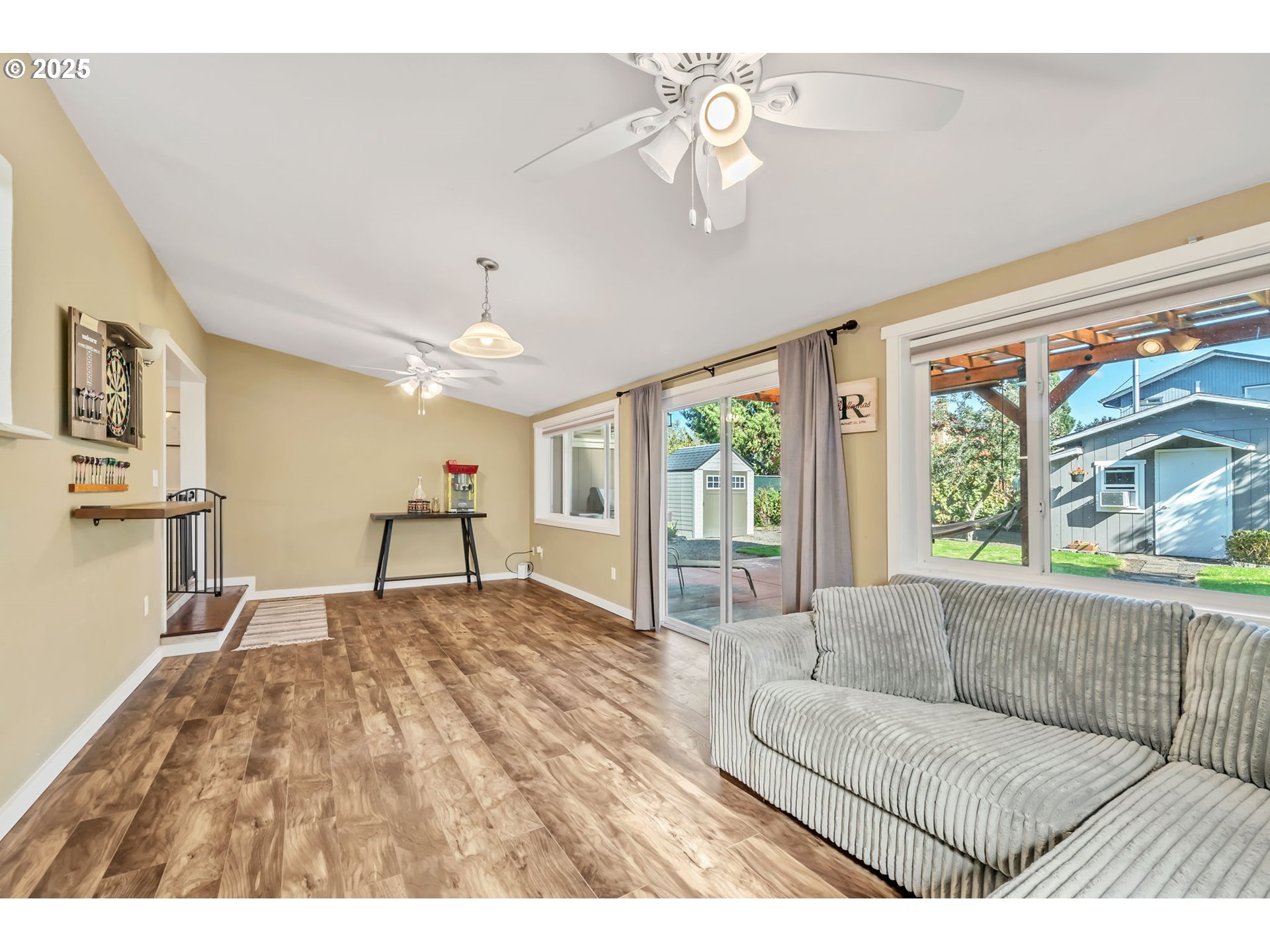 515 70th Street Springfield, OR 97478 - Photo 19 of 47 a living room with furniture and a large window