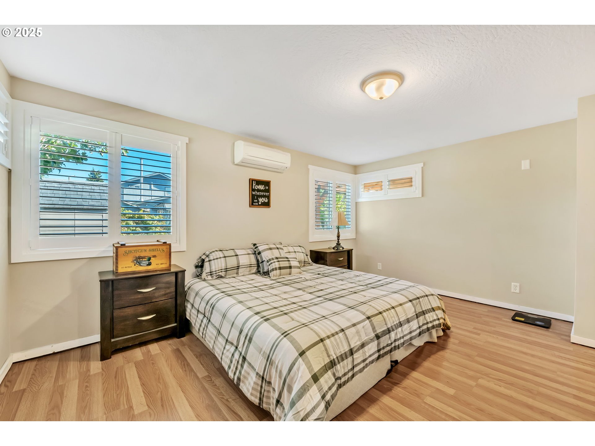 515 70th Street Springfield, OR 97478 - Photo 24 of 47 a bedroom with a bed and a large window