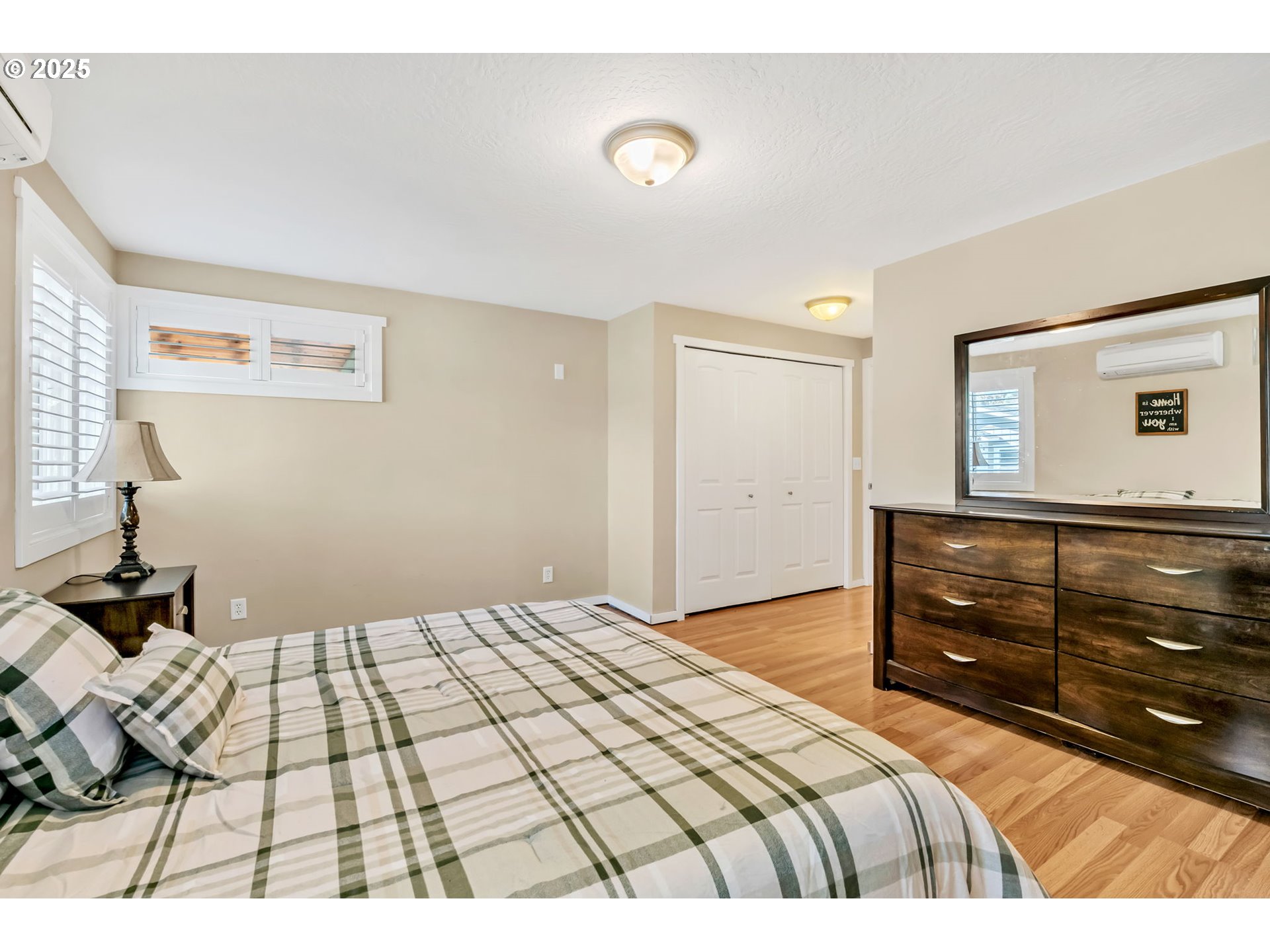515 70th Street Springfield, OR 97478 - Photo 25 of 47 a bedroom with a bed and a dresser
