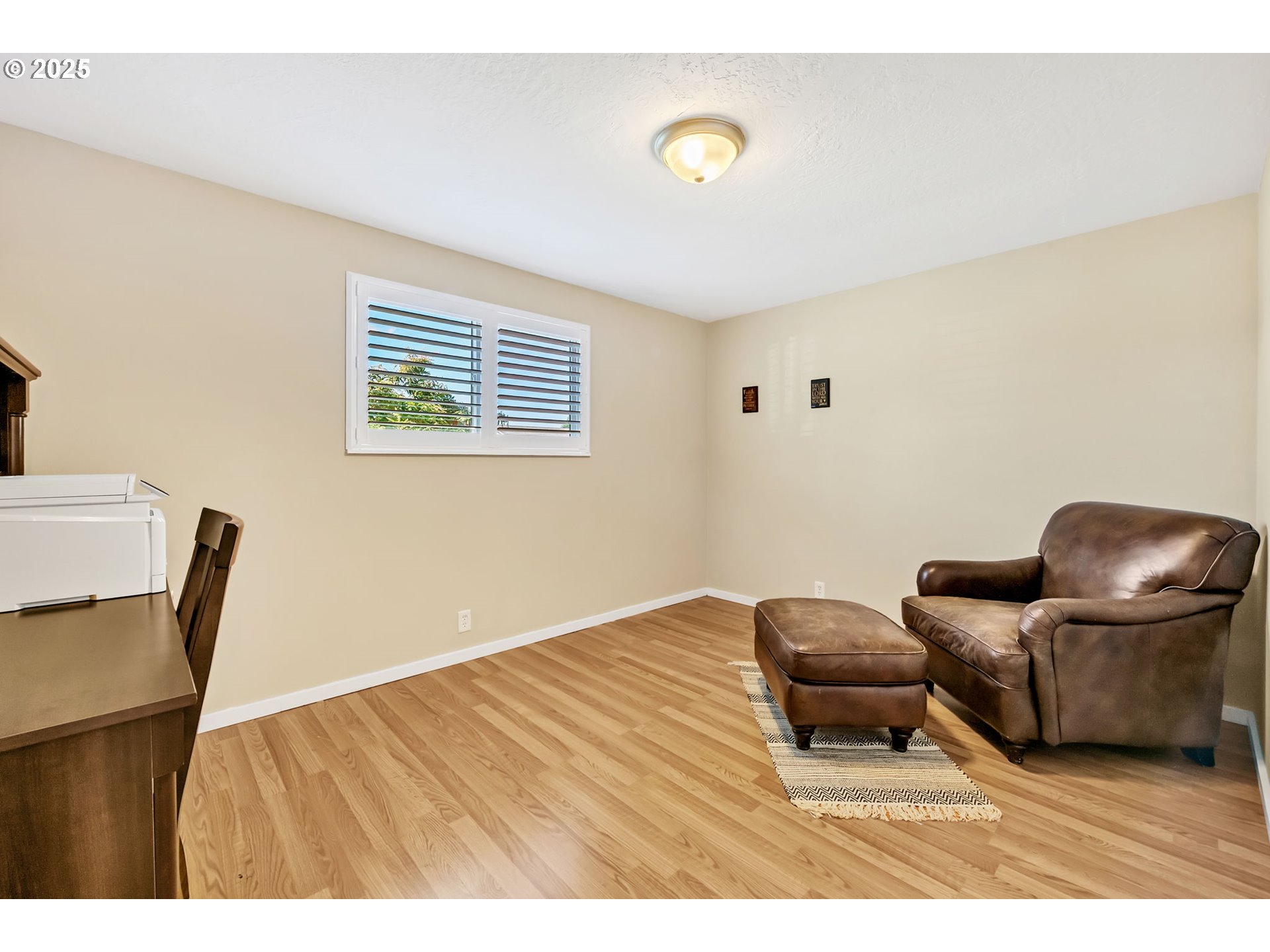 515 70th Street Springfield, OR 97478 - Photo 27 of 47 a living room with furniture and a flat screen tv