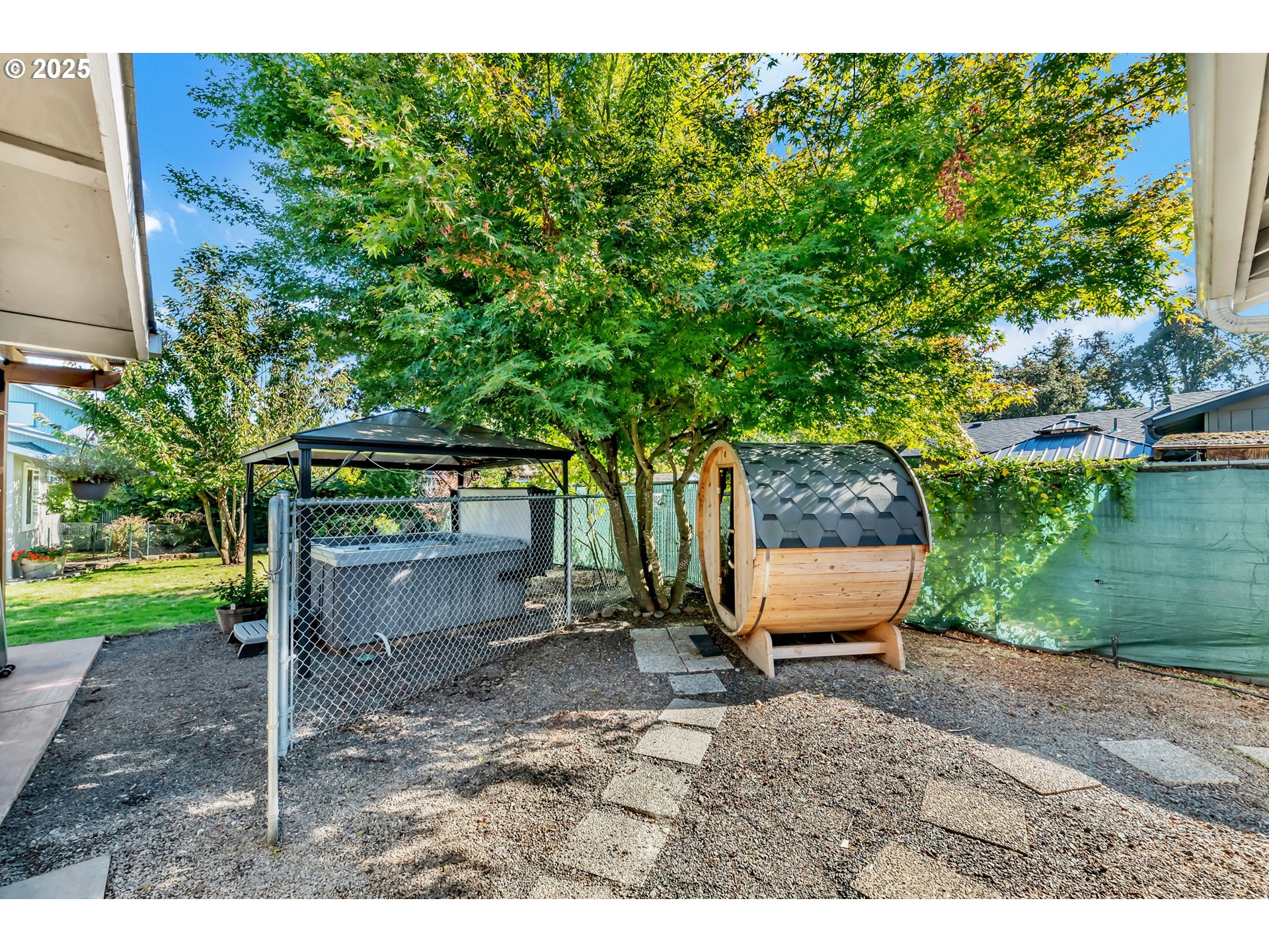 515 70th Street Springfield, OR 97478 - Photo 36 of 47 a view of a backyard with sitting area