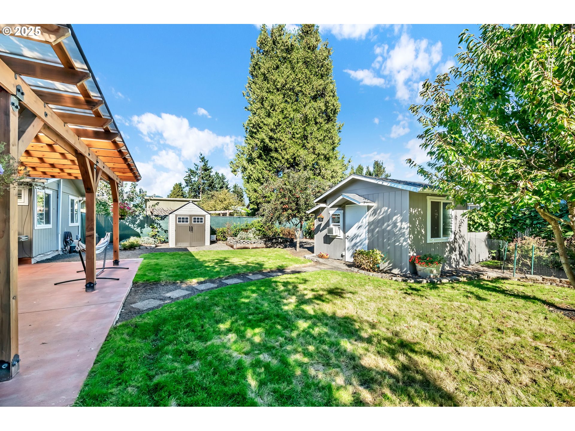 515 70th Street Springfield, OR 97478 - Photo 38 of 47 a view of a house with a yard