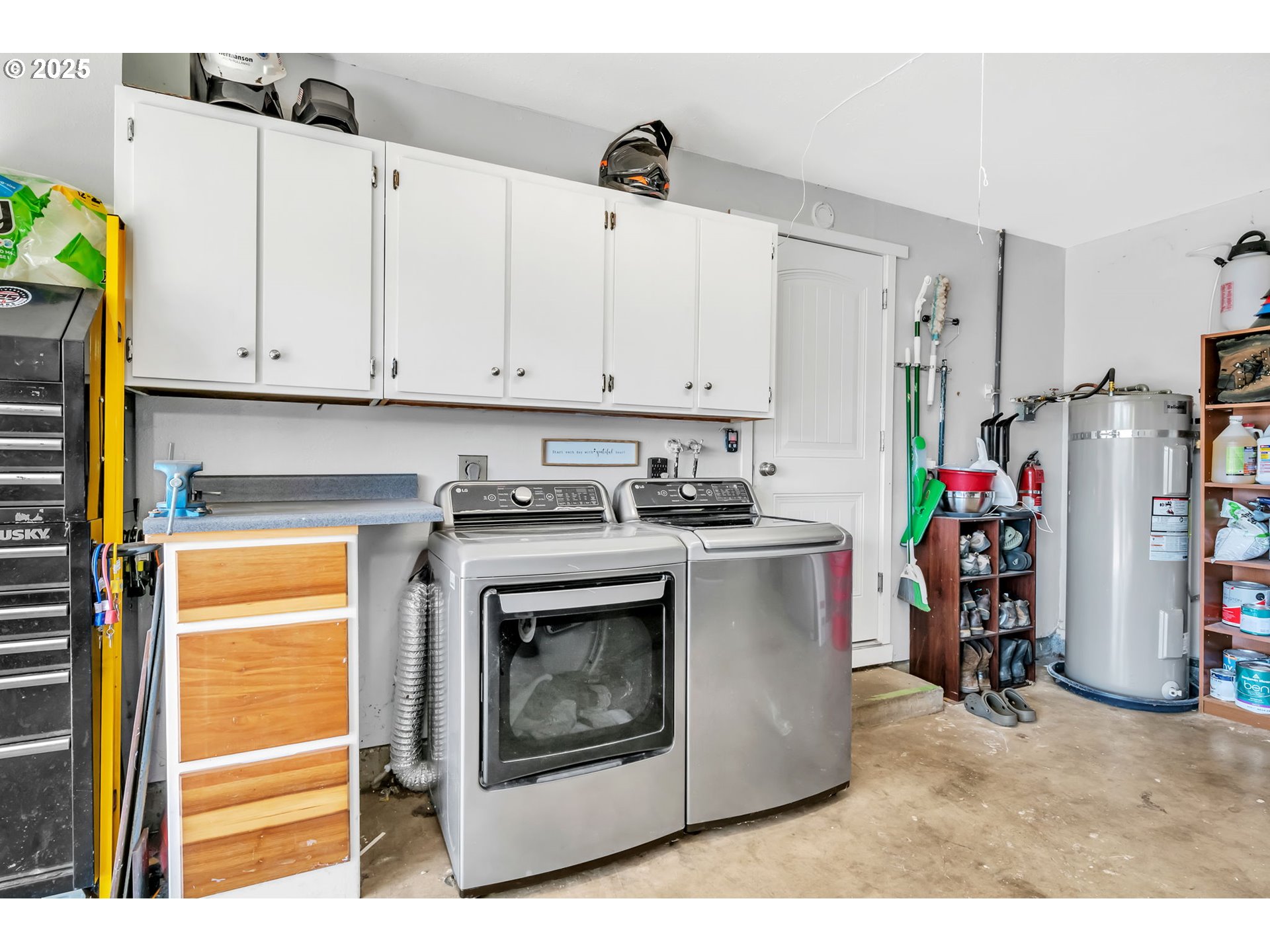 515 70th Street Springfield, OR 97478 - Photo 47 of 47 a utility room with fridge dryer and washer