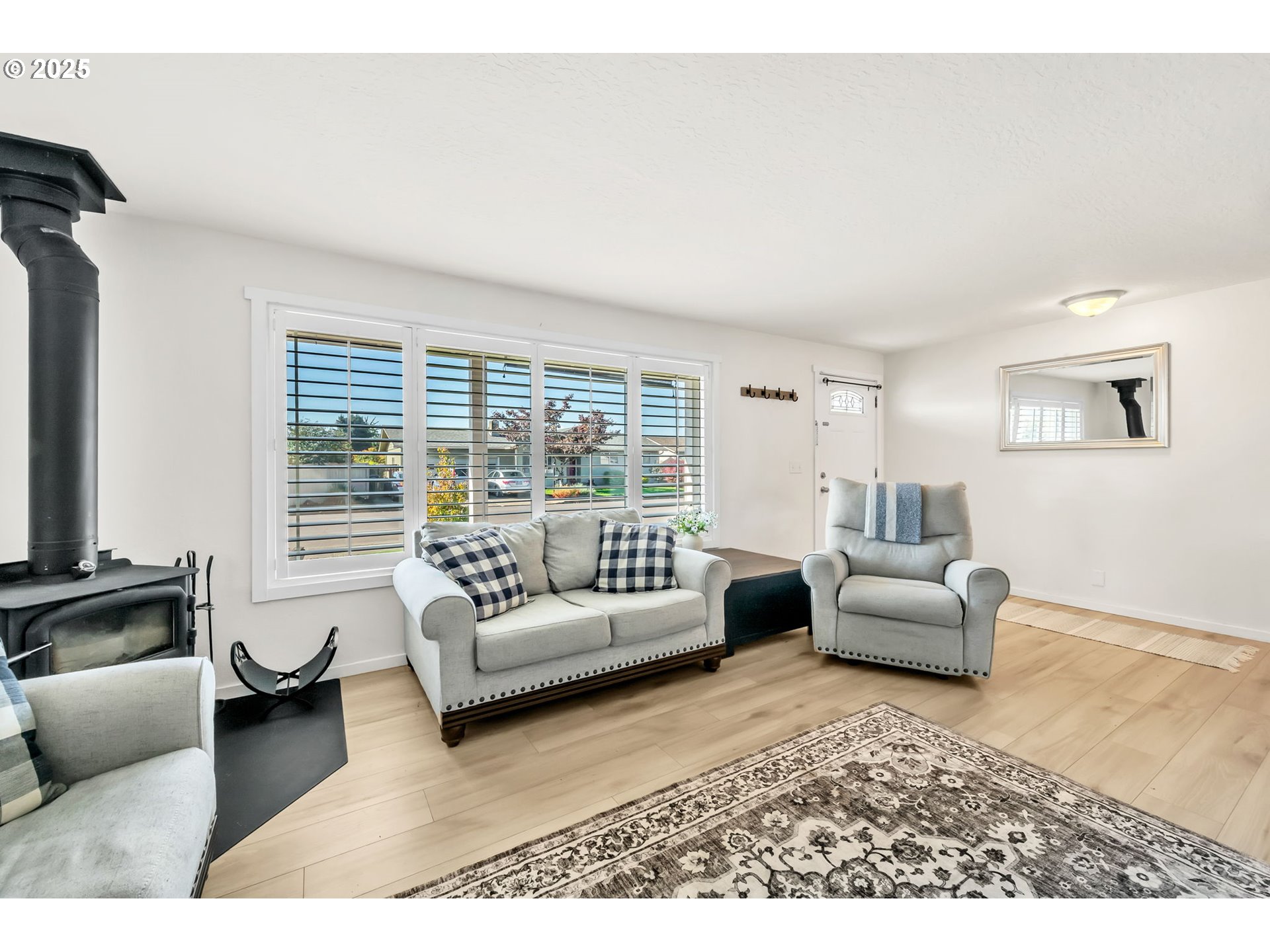 515 70th Street Springfield, OR 97478 - Photo 7 of 47 a living room with furniture and a large window