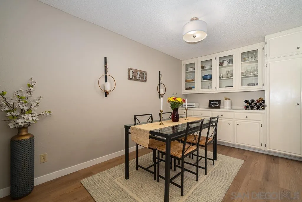 17617 Pomerado Road, Unit 215 San Diego, CA 92128 - Photo 11 of 64 a view of a dining room with furniture