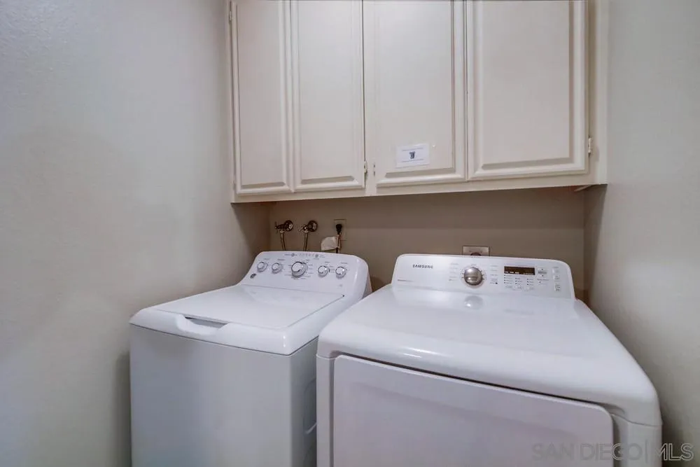 17617 Pomerado Road, Unit 215 San Diego, CA 92128 - Photo 31 of 64 a utility room with dryer and washer