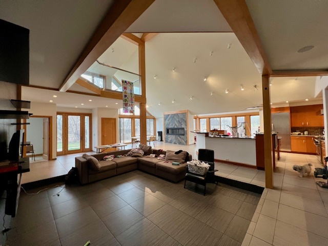 6738 Lakeridge Drive Long Grove, IL 60047 - Photo 16 of 23 a living room with furniture and a large window