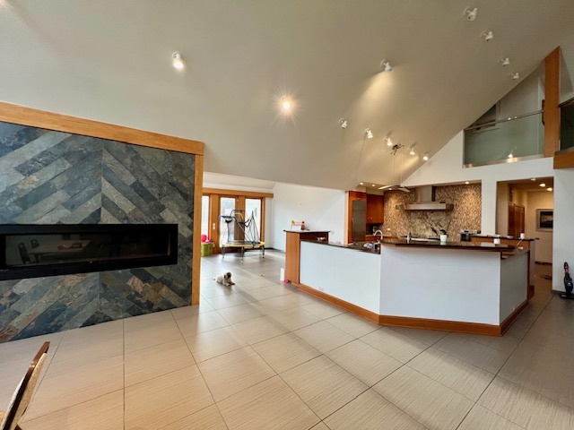 6738 Lakeridge Drive Long Grove, IL 60047 - Photo 2 of 23 a large kitchen with stainless steel appliances a large counter top a stove and a refrigerator