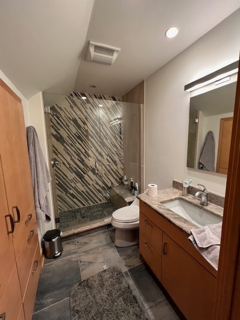 6738 Lakeridge Drive Long Grove, IL 60047 - Photo 7 of 23 a bathroom with a granite countertop sink mirror vanity and toilet