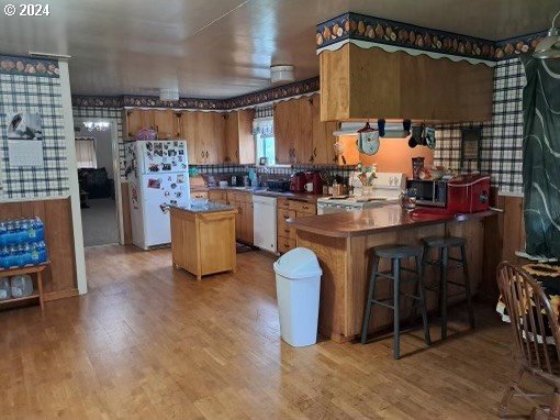 5961 Lookingglass Road Roseburg, OR 97471 - Photo 32 of 40 a kitchen with a sink and a stove top oven