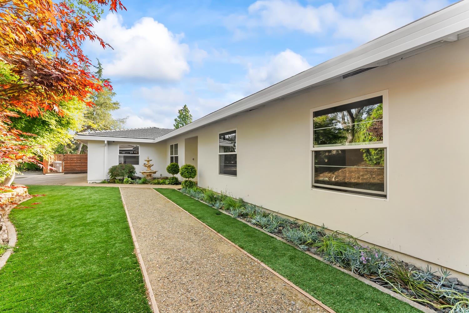 6762 Highland Road Granite Bay, CA 95746 - Photo 14 of 90 a front view of a house with a yard