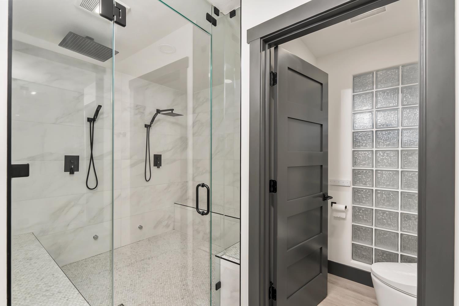 6762 Highland Road Granite Bay, CA 95746 - Photo 40 of 90 a bathroom with a shower and a glass door