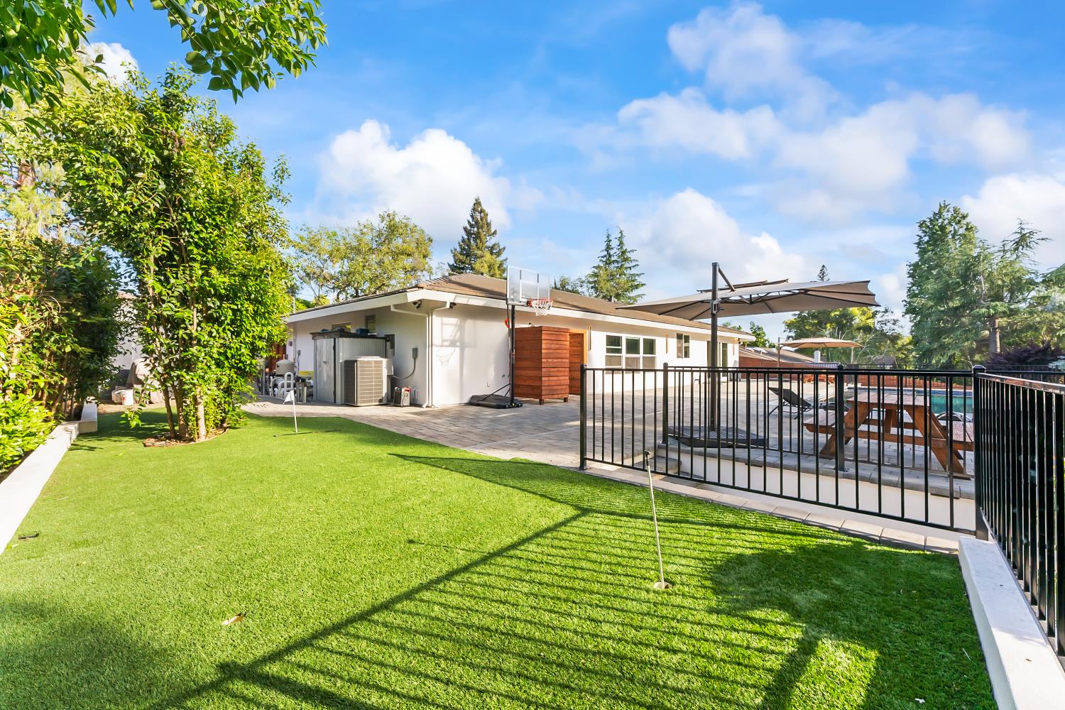 6762 Highland Road Granite Bay, CA 95746 - Photo 50 of 90 a view of a backyard with a garden