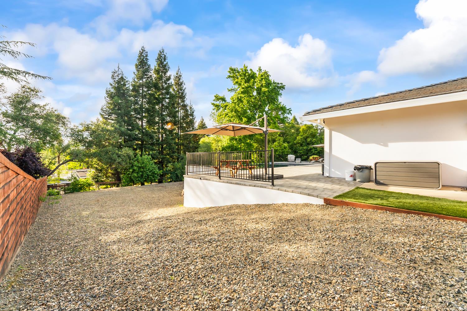 6762 Highland Road Granite Bay, CA 95746 - Photo 57 of 90 a view of a backyard with large trees