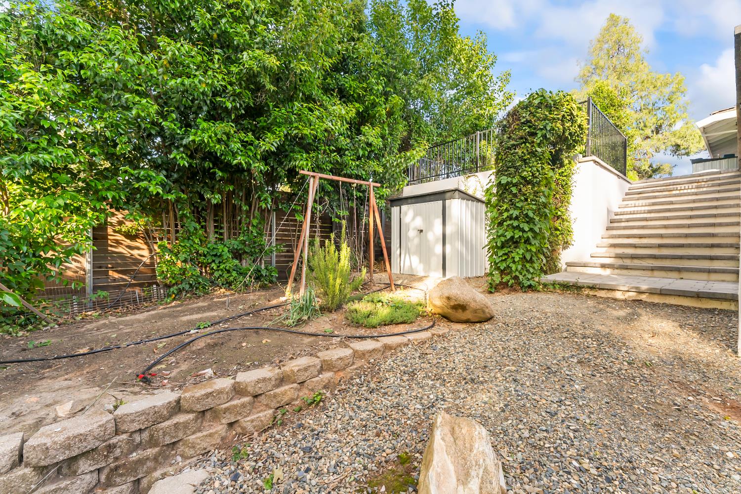 6762 Highland Road Granite Bay, CA 95746 - Photo 61 of 90 a view of a house with backyard and garden