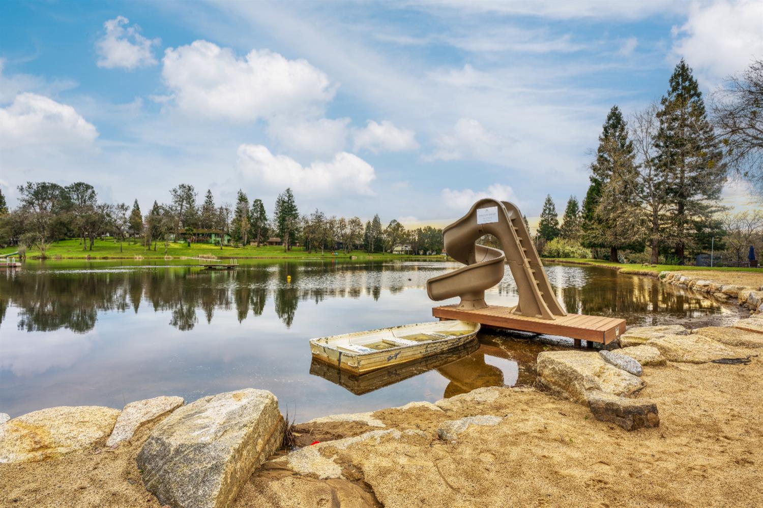 6762 Highland Road Granite Bay, CA 95746 - Photo 86 of 90 a view of a lake with houses