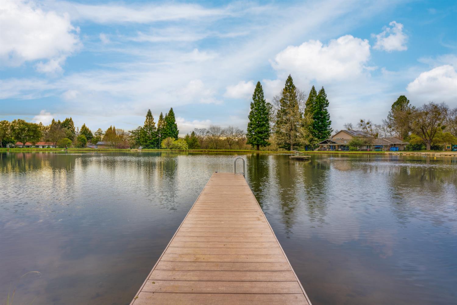 6762 Highland Road Granite Bay, CA 95746 - Photo 89 of 90 a view of a lake with a large trees