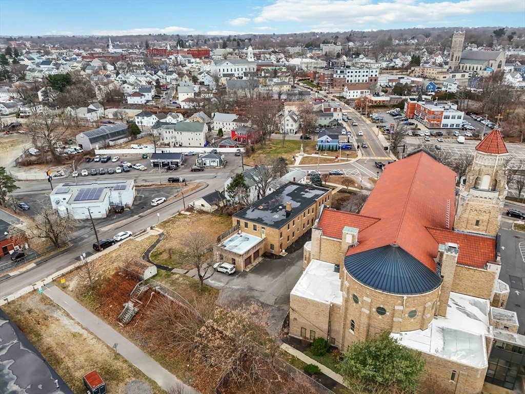 1 East Main Street Milford, MA 01757 - Photo 10 of 11 an aerial view of residential houses with outdoor space
