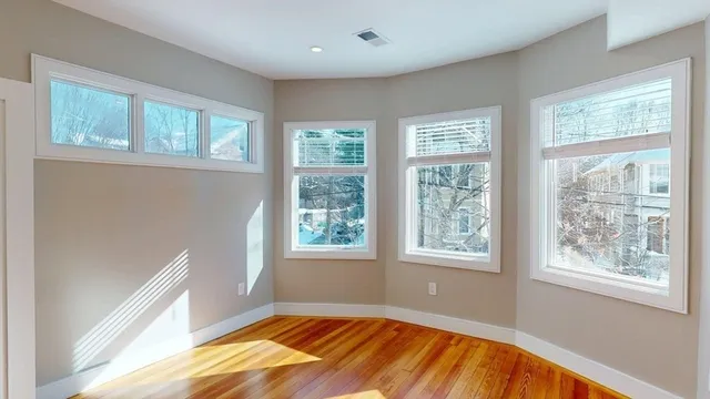 a view of an empty room and window