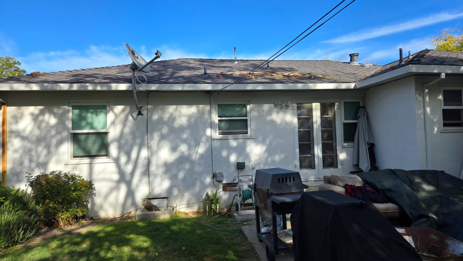 8043 Valencia Avenue Stockton, CA 95209 - Photo 13 of 15 a backyard of a house with table and chairs