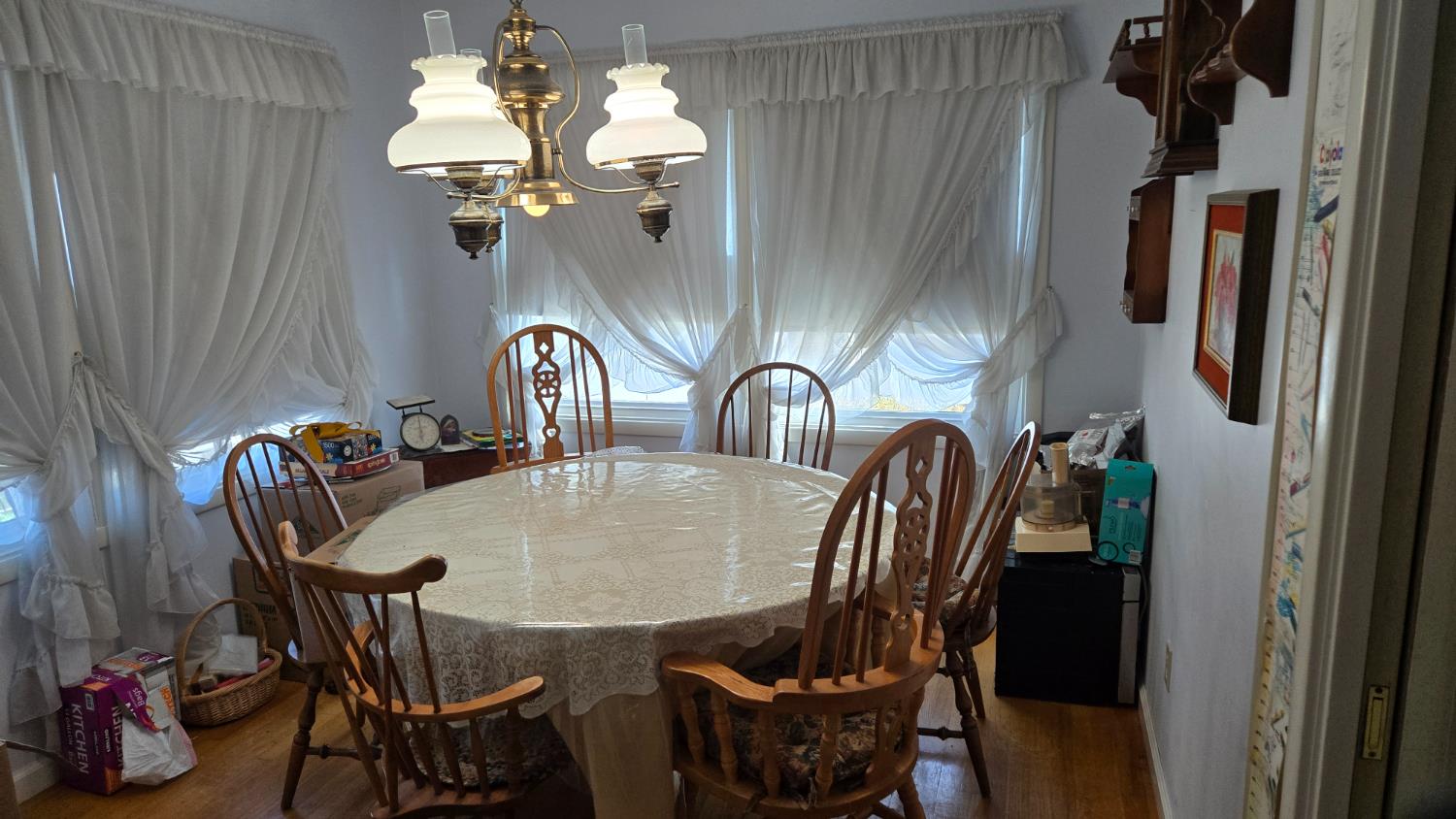 8043 Valencia Avenue Stockton, CA 95209 - Photo 5 of 15 a dining room with furniture and wooden floor