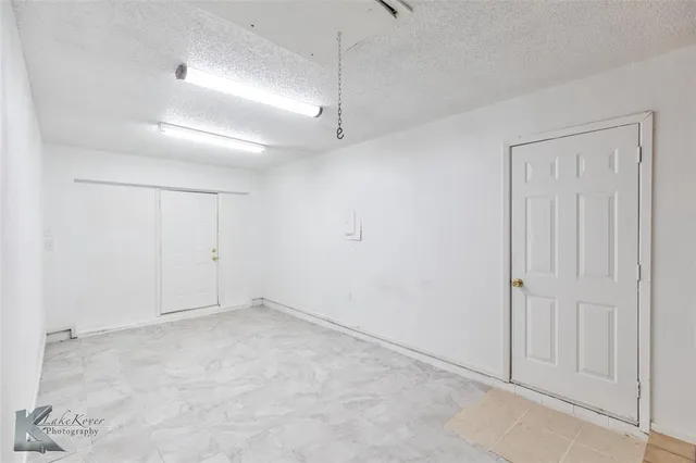 an empty room with an entryway