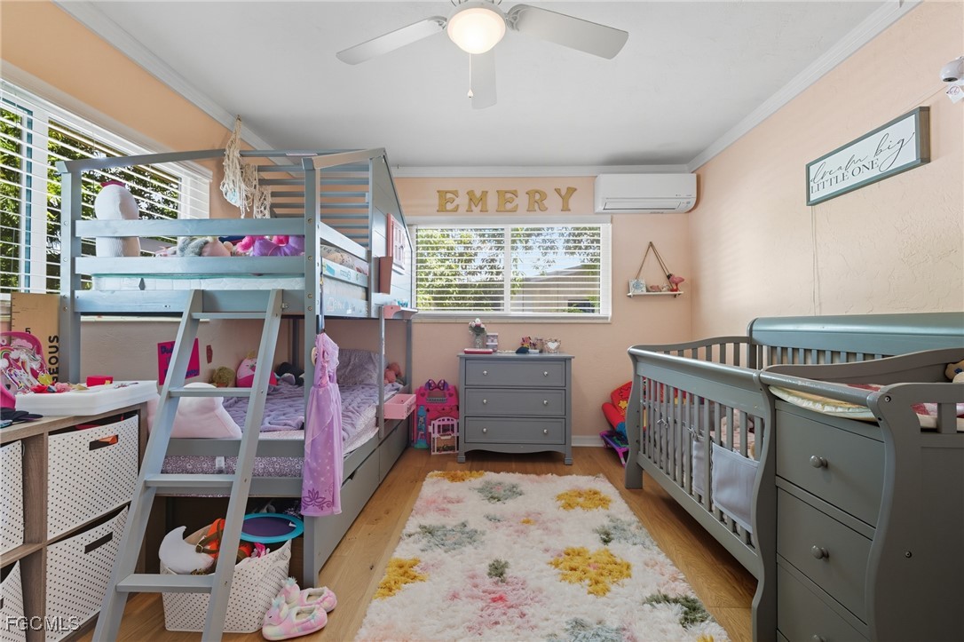 1420 Mandel Road Fort Myers, FL 33919 - Photo 11 of 41 a bed room with a bed and a window