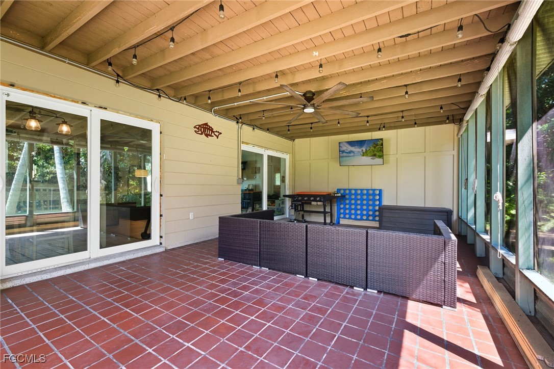 1420 Mandel Road Fort Myers, FL 33919 - Photo 29 of 41 a outdoor space with lots of furniture and windows