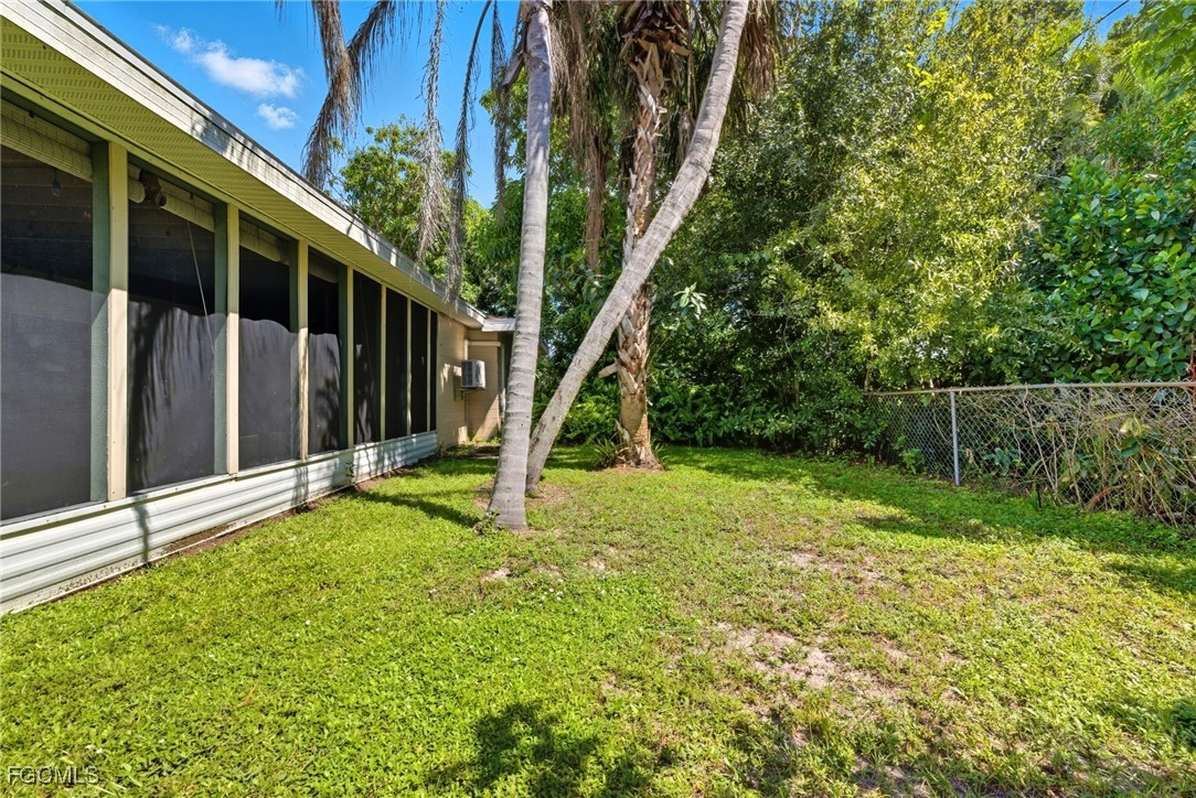1420 Mandel Road Fort Myers, FL 33919 - Photo 32 of 41 a view of a garden with a slide