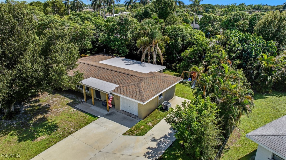 1420 Mandel Road Fort Myers, FL 33919 - Photo 39 of 41 an aerial view of a house with a yard