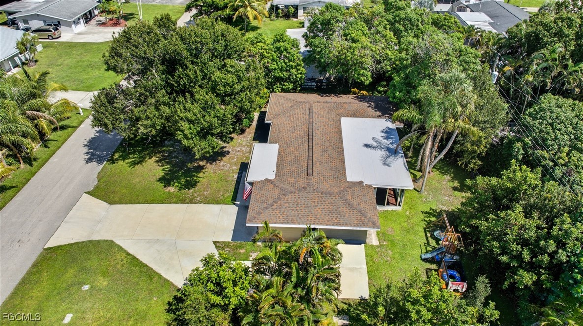 1420 Mandel Road Fort Myers, FL 33919 - Photo 40 of 41 an aerial view of a house with a yard and garden