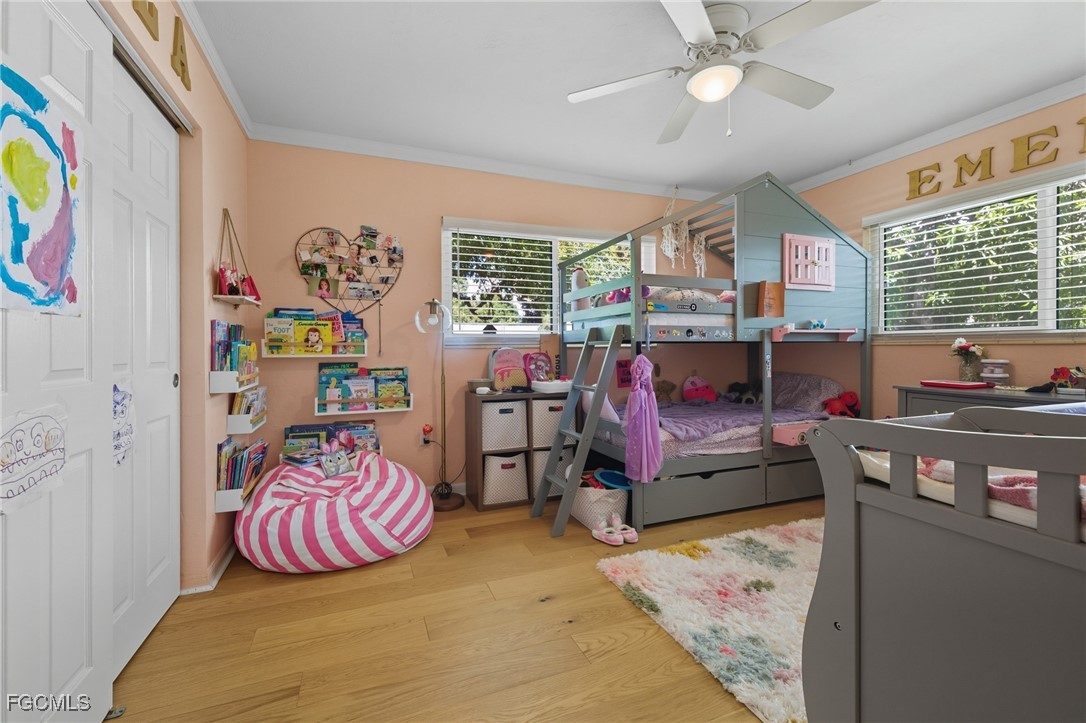 1420 Mandel Road Fort Myers, FL 33919 - Photo 10 of 41 a bedroom with furniture and a bed