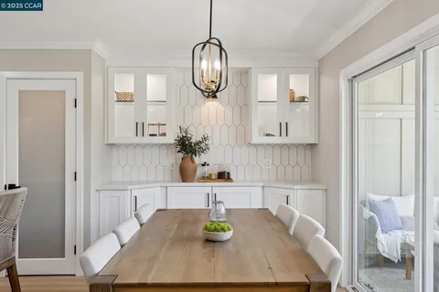 a dining room with wooden floor