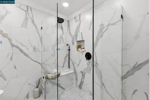 a view of a hallway with washer and dryer