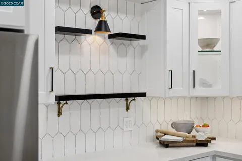 a bathroom with a sink and a shower curtain