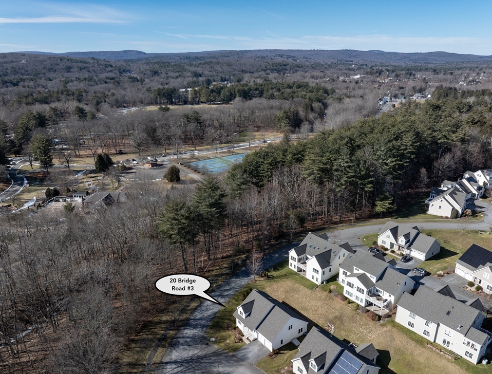 20 Bridge Road, Unit 3 Northampton, MA 01062 - Photo 6 of 36 an aerial view of a house with a yard