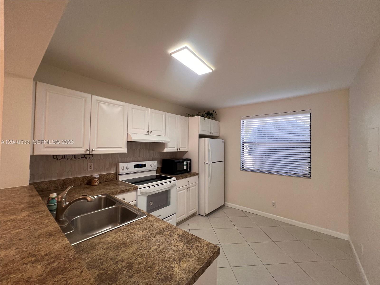 5661 Riverside Drive, Unit 101B7 Coral Springs, FL 33067 - Photo 9 of 37