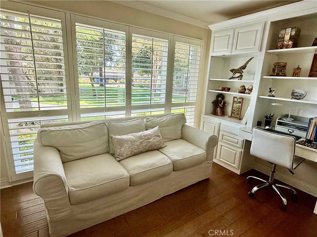 199 Avenida Majorca, Unit C Laguna Woods, CA 92637 - Photo 13 of 30 a living room with furniture and a window