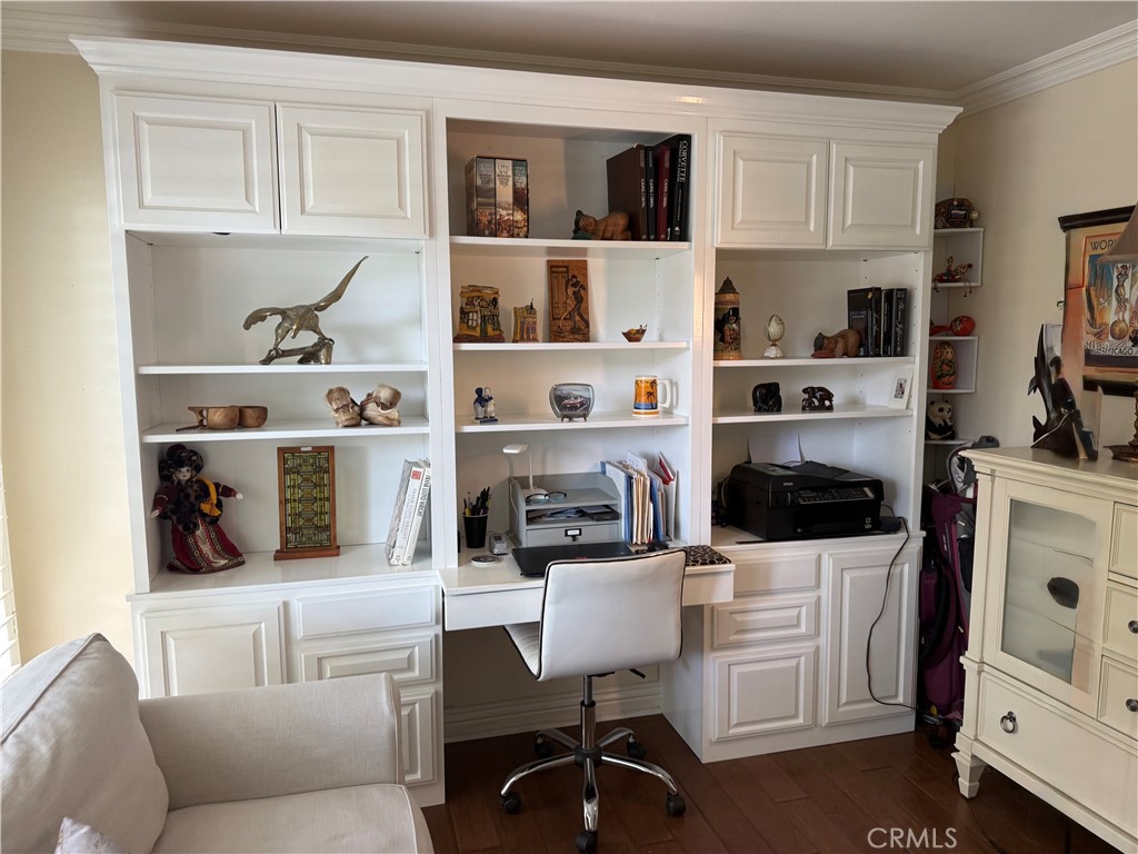 199 Avenida Majorca, Unit C Laguna Woods, CA 92637 - Photo 14 of 30 a living room with furniture a flat screen tv and view of kitchen